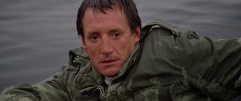 Movie still from “Jaws 2” (1978), directed by Jeannot Szwarc – A person wearing a jacket; Close Up shot, High angle