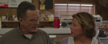 Movie still from “Jerry and Marge Go Large” (2022), directed by David Frankel – An older man and a younger woman in a kitchen; Close Up shot, Over the shoulder angle