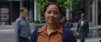 Movie still from “Jerry and Marge Go Large” (2022), directed by David Frankel – A person wearing a brown shirt; Close Up shot, Low angle