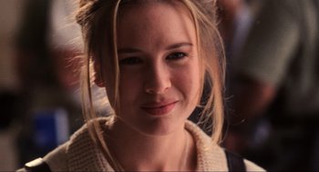 Movie still from “Jerry Maguire” (1996), directed by Cameron Crowe – A young woman's face; Close Up shot, Over the shoulder angle