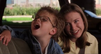 Movie still from “Jerry Maguire” (1996), directed by Cameron Crowe – A woman and a boy in a car; Close Up shot, Low angle