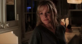 Movie still from “Jerry Maguire” (1996), directed by Cameron Crowe – A person in a room near a window; Close Up shot, Low angle