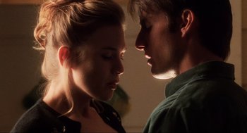 Movie still from “Jerry Maguire” (1996), directed by Cameron Crowe – A man and a woman face to face in a room; Close Up shot, Low angle