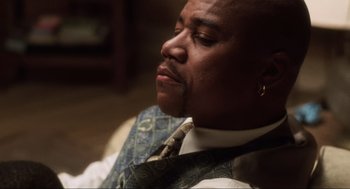 Movie still from “Jerry Maguire” (1996), directed by Cameron Crowe – A person wearing a neck tie; Close Up shot, Low angle