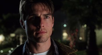 Movie still from “Jerry Maguire” (1996), directed by Cameron Crowe – A person wearing a jacket; Close Up shot, Over the shoulder angle