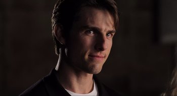 Movie still from “Jerry Maguire” (1996), directed by Cameron Crowe – A person wearing a jacket; Close Up shot, Over the shoulder angle