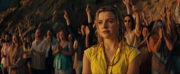 Movie still from “Jesus Revolution” (2023), directed by Brent McCorkle – A group of people standing in front of each other; Close Up shot, Low angle