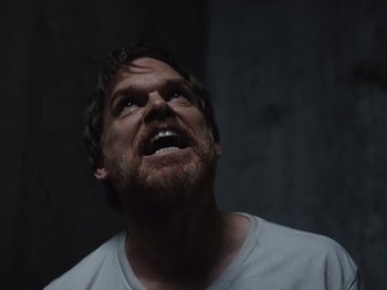 Movie still from “John and the Hole” (2021), directed by Pascual Sisto – A person with a mouth open; Close Up shot, Low angle