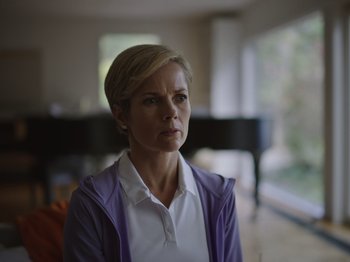 Movie still from “John and the Hole” (2021), directed by Pascual Sisto – A person with short blonde hair; Close Up shot, Low angle
