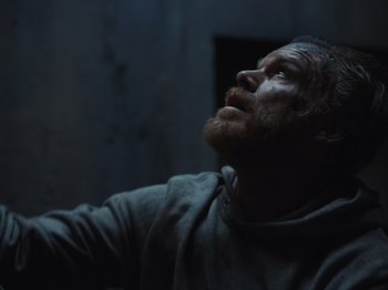 Movie still from “John and the Hole” (2021), directed by Pascual Sisto – A person looking up at the sky; Close Up shot, Low angle