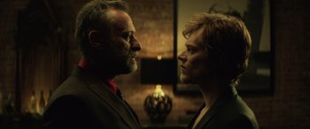 Movie still from “John Wick” (2014), directed by Chad Stahelski – Two men standing next to each other face to face; Close Up shot, Over the shoulder angle