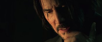Movie still from “John Wick” (2014), directed by Chad Stahelski – A person with a beard; Close Up shot, Low angle