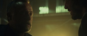 Movie still from “John Wick” (2014), directed by Chad Stahelski – A man's face in a dark room; Close Up shot, Low angle