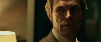 Movie still from “John Wick” (2014), directed by Chad Stahelski – A person wearing a suit and tie; Close Up shot, Low angle