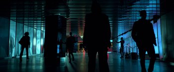 Movie still from “John Wick: Chapter 2” (2017), directed by Chad Stahelski – A group of people walking in a building at night; Wide shot, Low angle