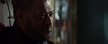 Movie still from “John Wick: Chapter 2” (2017), directed by Chad Stahelski – A person with a beard; Close Up shot, Low angle