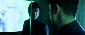 Movie still from “John Wick: Chapter 2” (2017), directed by Chad Stahelski – A man looking at himself in the mirror; Close Up shot, Over the shoulder angle