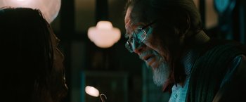 Movie still from “John Wick: Chapter 3 - Parabellum” (2019), directed by Chad Stahelski – An older man with glasses looking at the camera; Close Up shot, Low angle