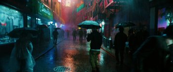 Movie still from “John Wick: Chapter 3 - Parabellum” (2019), directed by Chad Stahelski – A group of people walking down a street in the rain; Wide shot, High angle