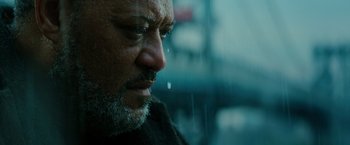 Movie still from “John Wick: Chapter 3 - Parabellum” (2019), directed by Chad Stahelski – A man's face in the rain; Close Up shot, Low angle