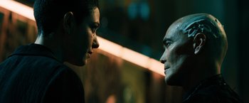 Movie still from “John Wick: Chapter 3 - Parabellum” (2019), directed by Chad Stahelski – Two people face to face in a dark room; Close Up shot, Over the shoulder angle