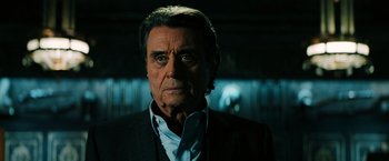 Movie still from “John Wick: Chapter 3 - Parabellum” (2019), directed by Chad Stahelski – A person wearing a suit and tie; Close Up shot, Low angle