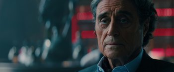 Movie still from “John Wick: Chapter 3 - Parabellum” (2019), directed by Chad Stahelski – An older man is looking into the distance; Close Up shot, Over the shoulder angle