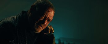 Movie still from “John Wick: Chapter 3 - Parabellum” (2019), directed by Chad Stahelski – An older man holding a baseball bat in his hand; Close Up shot, Low angle