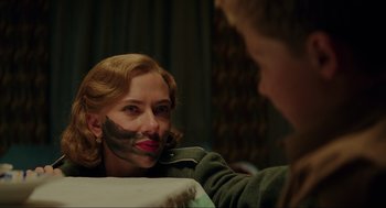 Movie still from “Jojo Rabbit” (2019), directed by Taika Waititi – A woman is sitting in front of a mirror and looking at a man; Close Up shot, Over the shoulder angle
