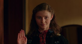 Movie still from “Jojo Rabbit” (2019), directed by Taika Waititi – A young girl is holding her hand up to the camera; Close Up shot, Over the shoulder angle