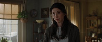 Movie still from “Jumanji: The Next Level” (2019), directed by Jake Kasdan – A woman standing in front of a wall; Close Up shot, Over the shoulder angle