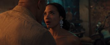 Movie still from “Jumanji: The Next Level” (2019), directed by Jake Kasdan – A beautiful woman standing next to a man in a room; Close Up shot, Over the shoulder angle