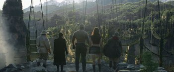 Movie still from “Jumanji: The Next Level” (2019), directed by Jake Kasdan – A group of people standing on top of a mountain; Wide shot, High angle
