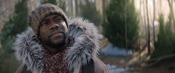 Movie still from “Jumanji: The Next Level” (2019), directed by Jake Kasdan – A person wearing a jacket; Close Up shot, Low angle