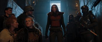 Movie still from “Jumanji: The Next Level” (2019), directed by Jake Kasdan – A group of people standing in a dark room; Medium shot, Low angle