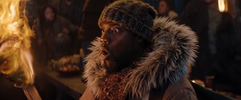 Movie still from “Jumanji: The Next Level” (2019), directed by Jake Kasdan – A person wearing a hat; Close Up shot, Low angle