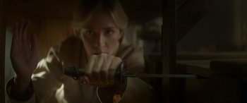 Movie still from “Jungle Cruise” (2021), directed by Jaume Collet-Serra – A woman is holding a sword in her hand; Close Up shot, Low angle