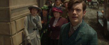 Movie still from “Jungle Cruise” (2021), directed by Jaume Collet-Serra – A group of people standing next to each other wearing hats; Close Up shot, Over the shoulder angle