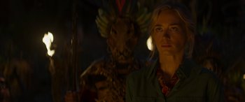 Movie still from “Jungle Cruise” (2021), directed by Jaume Collet-Serra – A woman standing in front of a dragon statue; Close Up shot, Over the shoulder angle