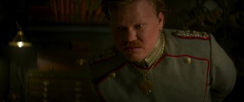 Movie still from “Jungle Cruise” (2021), directed by Jaume Collet-Serra – A man in a military uniform with a mustache; Close Up shot, Low angle