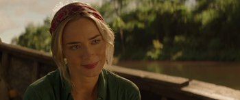 Movie still from “Jungle Cruise” (2021), directed by Jaume Collet-Serra – A person wearing a headband; Close Up shot, Over the shoulder angle