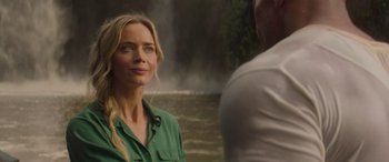 Movie still from “Jungle Cruise” (2021), directed by Jaume Collet-Serra – A woman standing next to a man in front of a body of water; Close Up shot, Over the shoulder angle