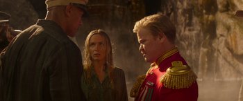 Movie still from “Jungle Cruise” (2021), directed by Jaume Collet-Serra – Two men and a woman standing next to each other; Close Up shot, Over the shoulder angle