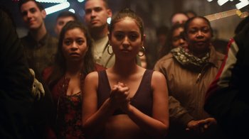 Movie still from “Euphoria” (2019), created by Sam Levinson – A group of people standing in a room with their hands clasped together; Close Up shot, Low angle
