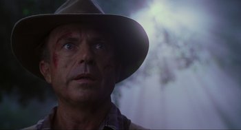 Movie still from “Jurassic Park III” (2001), directed by Joe Johnston – A person wearing a hat; Close Up shot, Low angle