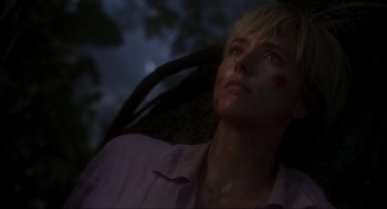Movie still from “Jurassic Park III” (2001), directed by Joe Johnston – A person looking up at the sky; Close Up shot, Low angle
