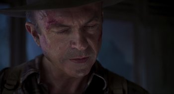 Movie still from “Jurassic Park III” (2001), directed by Joe Johnston – A person wearing a hat; Close Up shot, Low angle