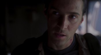 Movie still from “Jurassic Park III” (2001), directed by Joe Johnston – A person looking at the camera; Close Up shot, Low angle