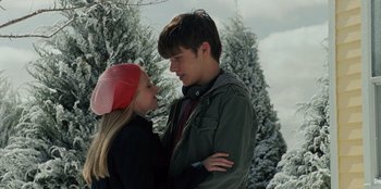 Movie still from “Jurassic World” (2015), directed by Colin Trevorrow – A man and a woman standing next to each other in the snow; Medium shot, Over the shoulder angle