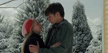 Movie still from “Jurassic World” (2015), directed by Colin Trevorrow – A man and a woman standing next to each other in the snow; Medium shot, Over the shoulder angle